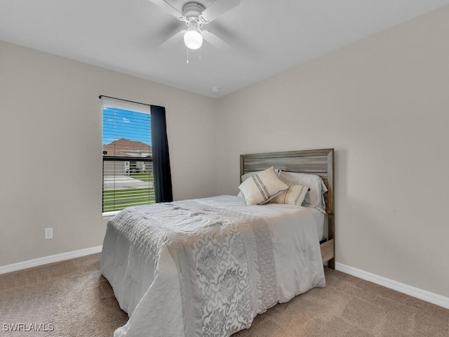 bedroom featuring ceiling fan and carpet floors