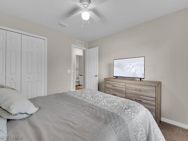 bedroom featuring ceiling fan, a closet, and carpet