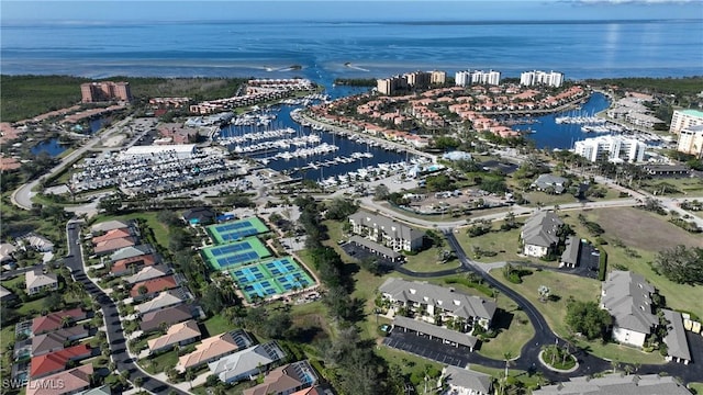 birds eye view of property featuring a water view