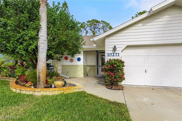 view of exterior entry featuring a garage