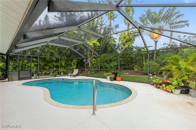 view of pool featuring a patio and a lanai