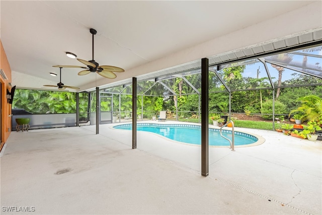 view of pool featuring a lanai and a patio area