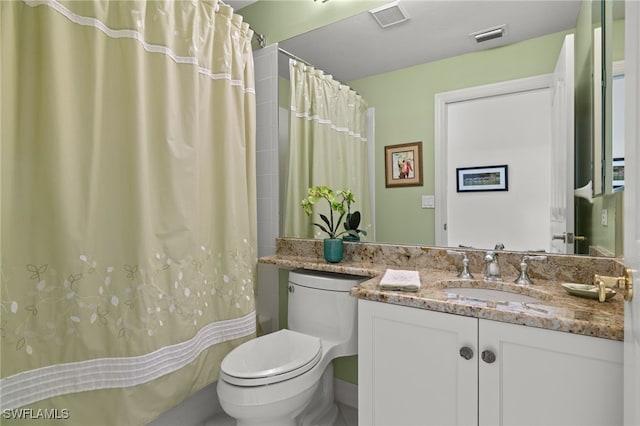 full bathroom with shower / bath combination with curtain, vanity, and toilet