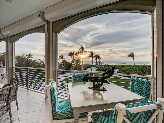 balcony featuring a water view