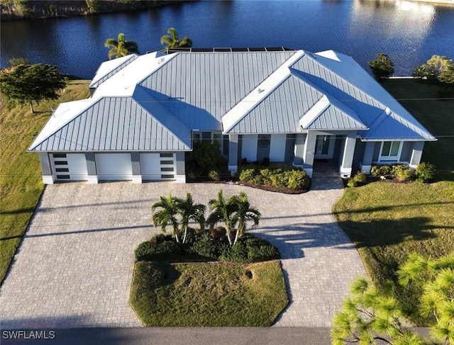 view of front of property with a water view