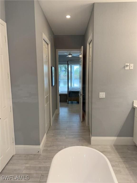 hallway featuring light hardwood / wood-style floors