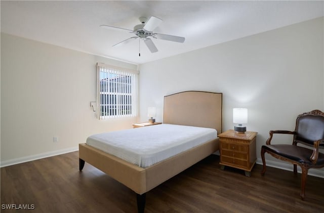 bedroom featuring dark wood-type flooring and ceiling fan