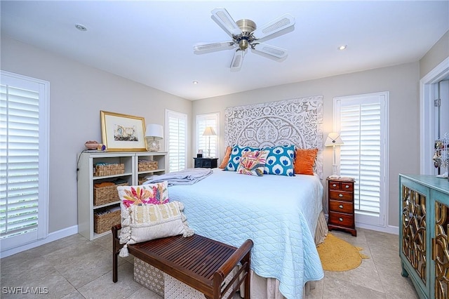 tiled bedroom with ceiling fan