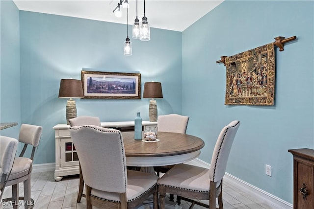 dining space featuring light hardwood / wood-style floors