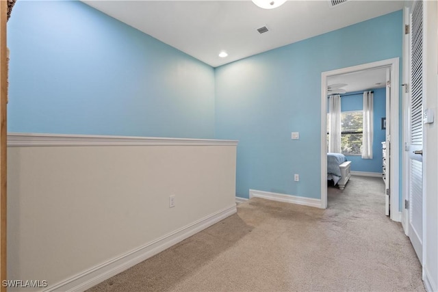 view of carpeted spare room