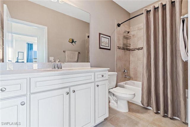 full bathroom featuring tile patterned floors, shower / bath combination with curtain, toilet, and vanity