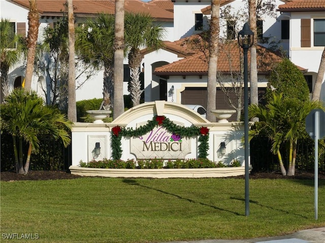 community sign with a lawn