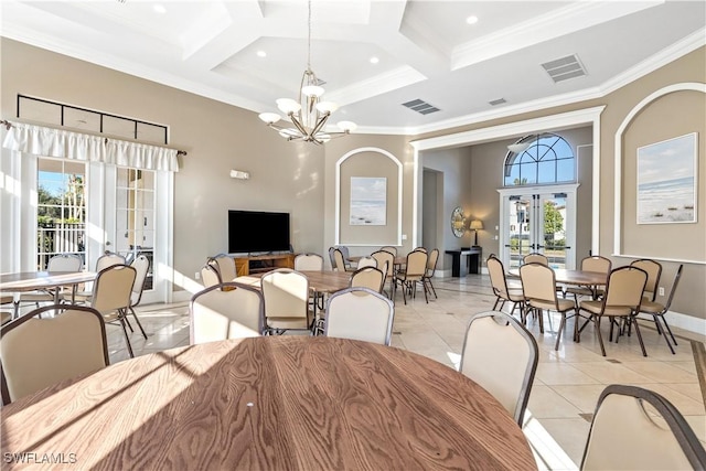 tiled dining area with a chandelier, french doors, coffered ceiling, and a healthy amount of sunlight