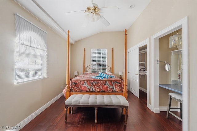 bedroom featuring dark hardwood / wood-style floors, ceiling fan, and lofted ceiling