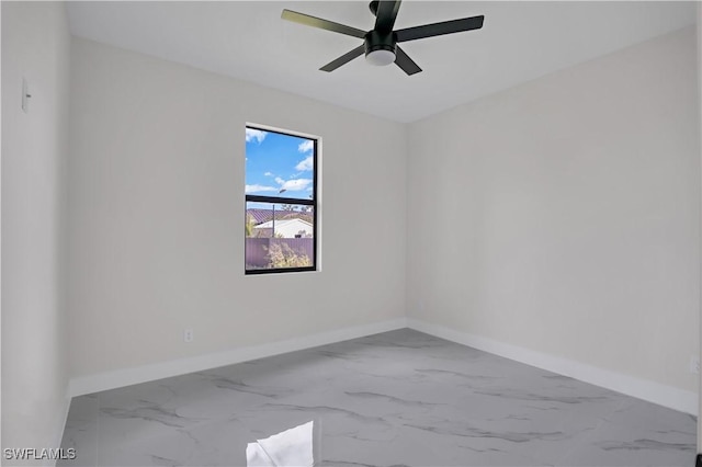 empty room featuring ceiling fan