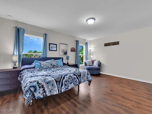 bedroom featuring dark hardwood / wood-style flooring