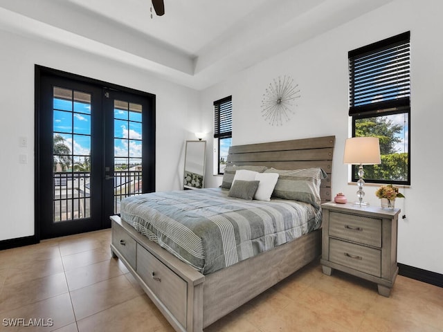 bedroom featuring light tile patterned floors, access to outside, ceiling fan, and baseboards