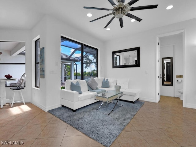 tiled living area with baseboards, ceiling fan, and recessed lighting