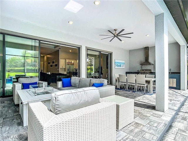 view of patio with outdoor lounge area and ceiling fan