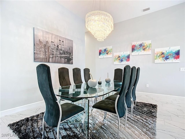 dining area with a notable chandelier