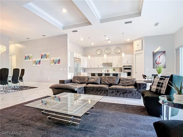 living room featuring crown molding