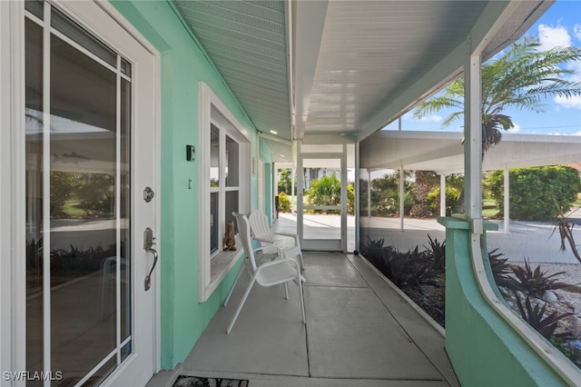 sunroom / solarium featuring a wealth of natural light