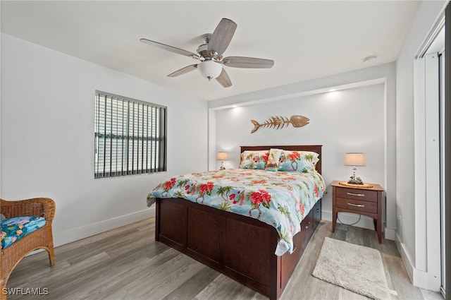 bedroom featuring wood-type flooring and ceiling fan