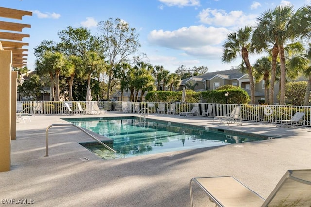 view of swimming pool featuring a patio area