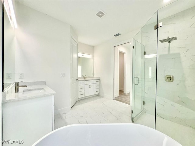 bathroom with vanity and plus walk in shower