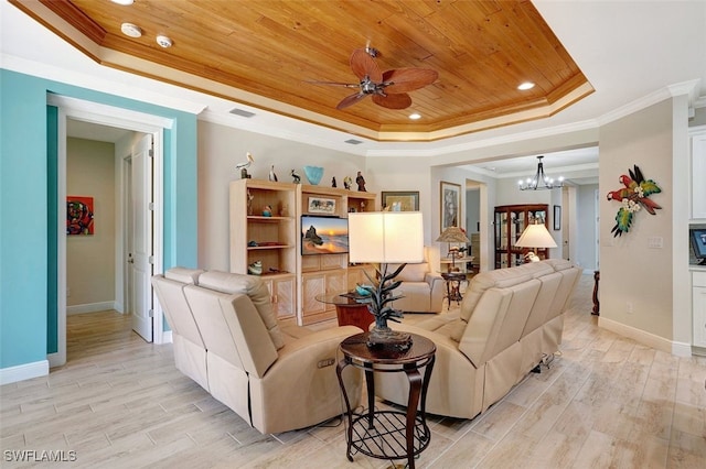 living room featuring wood ceiling, crown molding, a tray ceiling, light hardwood / wood-style floors, and ceiling fan with notable chandelier