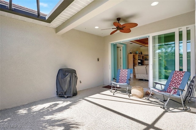 view of patio / terrace featuring ceiling fan