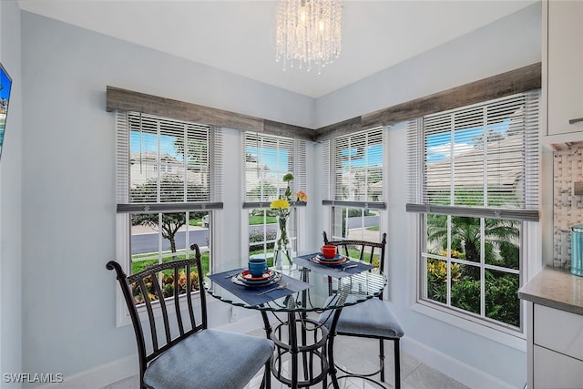 dining room with a notable chandelier