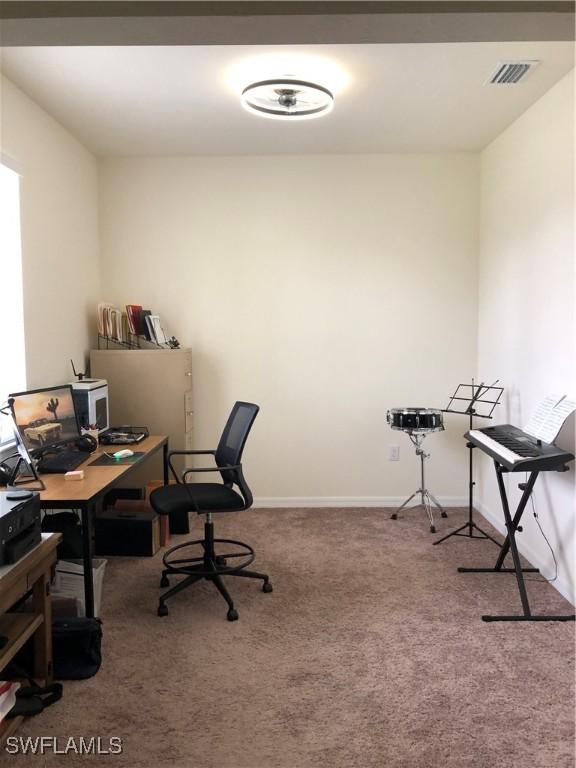 view of carpeted home office