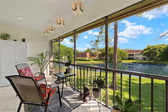 sunroom with a water view