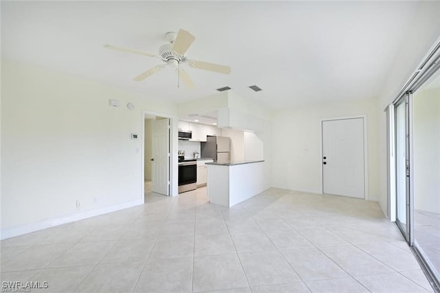 18 Bob O Link Ct Unit 18B, Naples, FL 34105 - unfurnished living room featuring a ceiling fan and light tile patterned floors