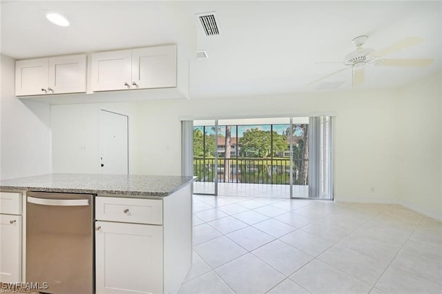 18 Bob O Link Ct Unit 18B, Naples, FL 34105 - kitchen featuring stainless steel dishwasher, light stone counters, light tile patterned floors, and white cabinets