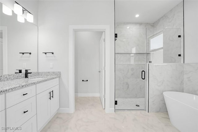 bathroom featuring shower with separate bathtub and vanity