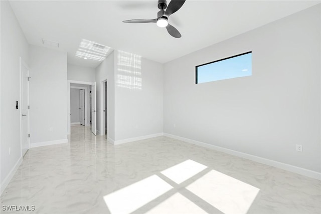 empty room featuring ceiling fan