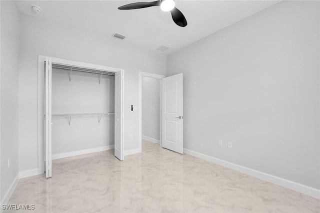 unfurnished bedroom with a closet and ceiling fan