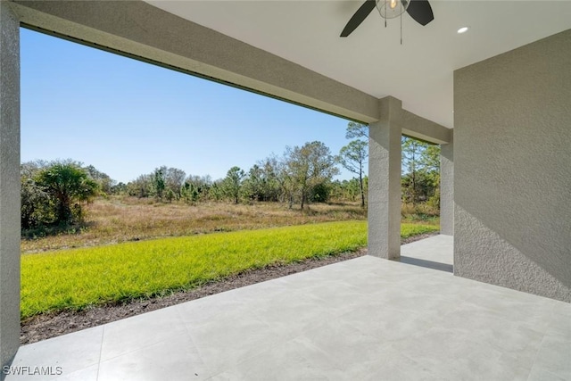 view of patio with ceiling fan