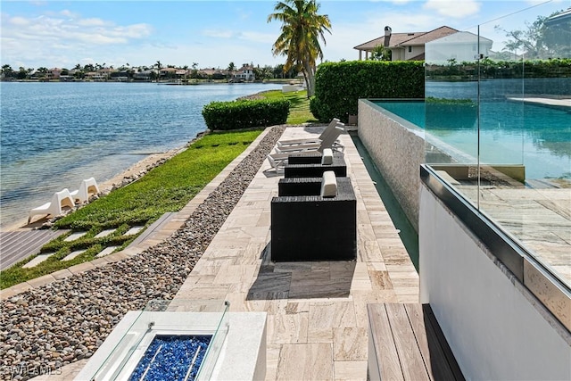 view of patio / terrace featuring a water view