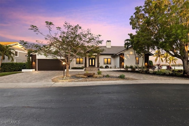 view of front of property featuring a garage