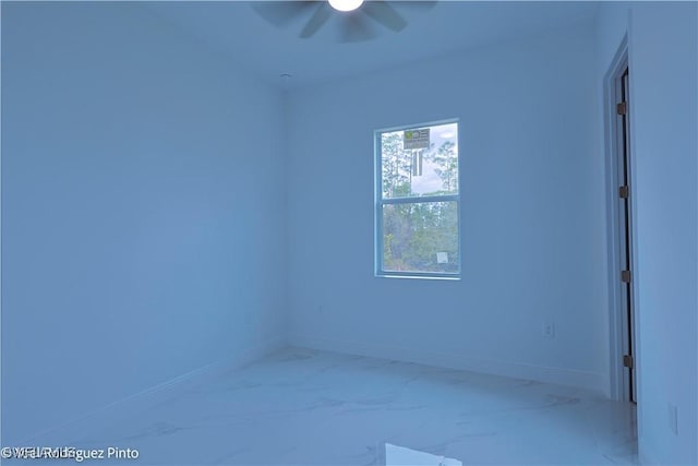 spare room featuring ceiling fan