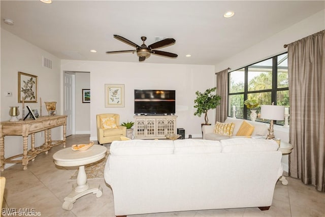 living area featuring a ceiling fan, recessed lighting, visible vents, and light tile patterned floors