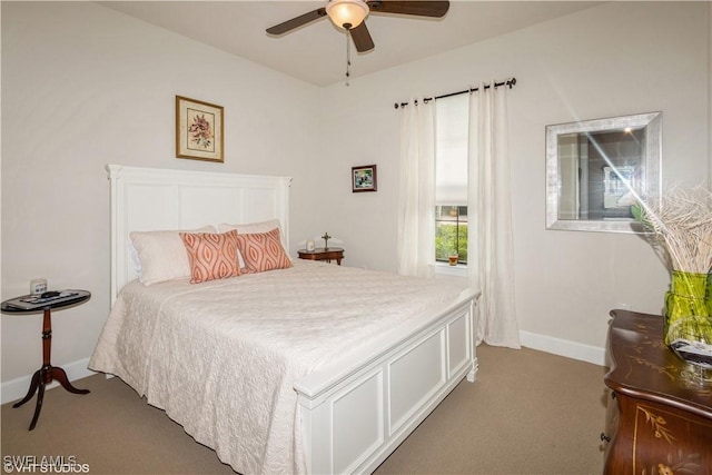 bedroom featuring carpet, a ceiling fan, and baseboards