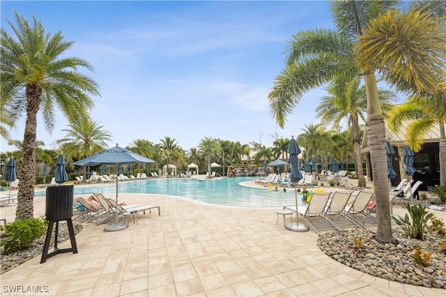 community pool with a patio