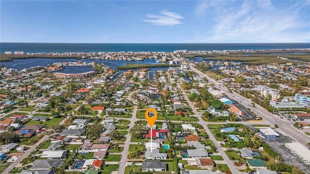 bird's eye view with a water view