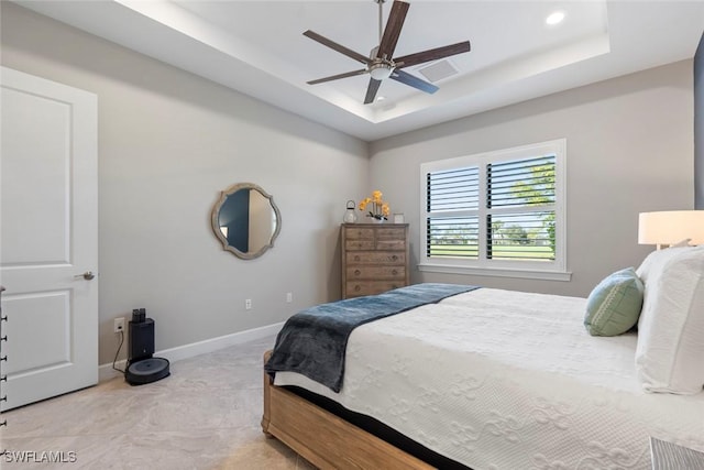 bedroom featuring a tray ceiling, ceiling fan, baseboards, and recessed lighting