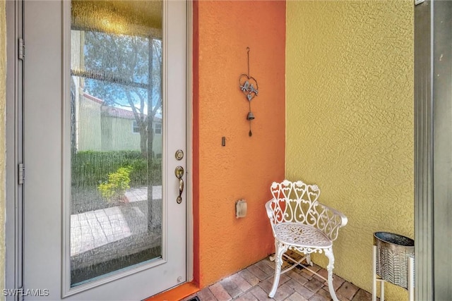 4350 Lazio Way Unit 1102, Fort Myers, FL 33901 - doorway to property featuring stucco siding
