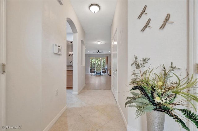 4350 Lazio Way Unit 1102, Fort Myers, FL 33901 - hall with arched walkways and baseboards